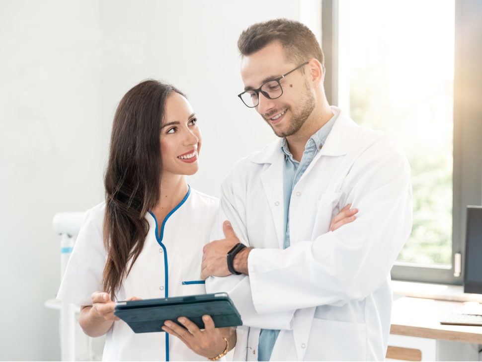 dental equipment | dentist at work | dentist looking over paperwork